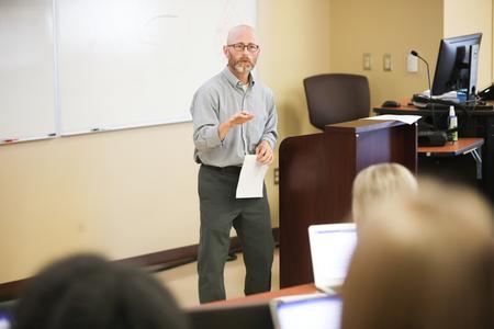 Andrew Martin, professor of pharmacy practice, lectures in Providence Hall. - Photo by Kristi McMurry Woody