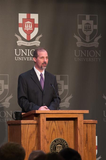 Sean Evans, professor of political science and department chair, introduces the speaker for the Constitution Day Lecture.  - Photo by Lynn Tucker