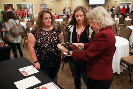 Jeanette Russ (right), professor of engineering and department chair, talks to a prospective student and her mother during a Day at the U. - Photo by Kristi McMurry Woody