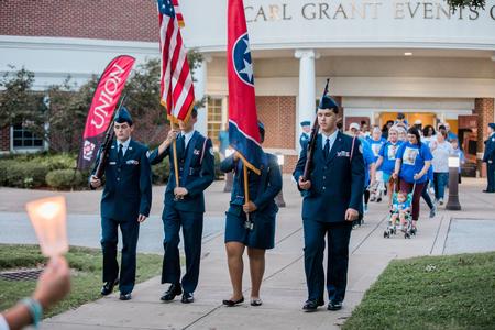 ROTC students lead the annual Remember Me Walk hosted by the Center for Just and Caring Communities.  - Photo by Kristi McMurry Woody