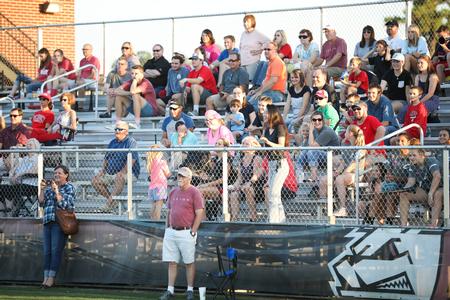 Fans watch as faculty and staff participate in a half-time shoot-out during the Community Appreciation Event hosted by Undergraduate Admissions. - Photo by Kristi McMurry Woody