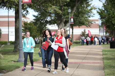 Elise Kolterman, public relations major, leads a tour group during Bulldog Days. - Photo by Kristi McMurry Woody