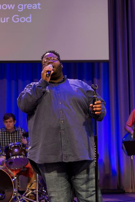 Cameron Smith, senior music major, leads students and faculty in worship during chapel. - Photo by Nikki Grim