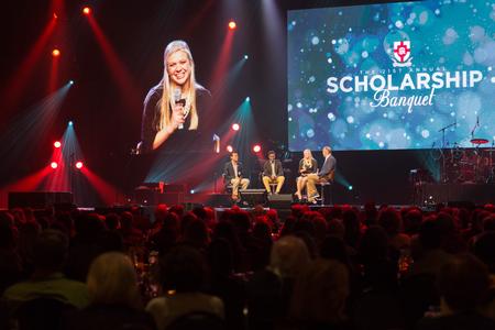 A panel of students talks with Dub Oliver, president of the university, about their experiences at Union University during the Scholarship Banquet.  - Photo by Riley Boggs