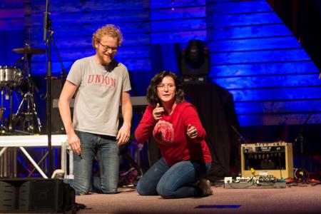 The Blank Slate Improv team entertains Homecoming guests in the chapel before the Anthem Lights concert.  - Photo by Nikki Grim