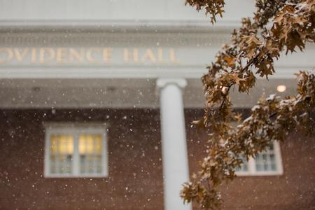 Snow falls in front of Providence Hall. - Photo by Kristi McMurry Woody