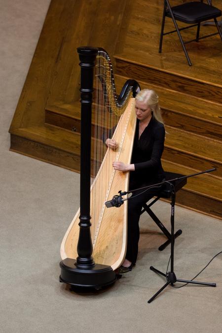 Ruthie Jo White, composition major, plays the harp during the annual Fall Orchestra Concert. - Photo by Nikki Grim