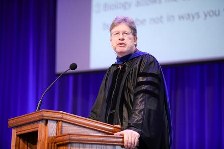 Mark Bolyard, university professor of biology and department chair, speaks in chapel for the Faculty Member of the Year chapel service.  - Photo by Kristi McMurry Woody