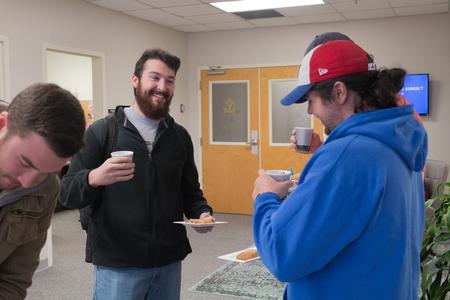 Students enjoy coffee and treats in the Vocatio Center during Stress-Free Friday before finals week. - Photo by Lynn Tucker