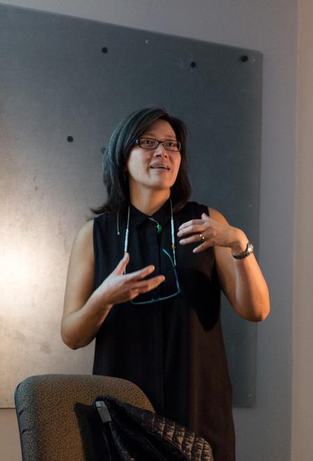 Haelim Allen, associate professor of art, presents her work through a lecture for students and staff. - Photo by Nikki Grim