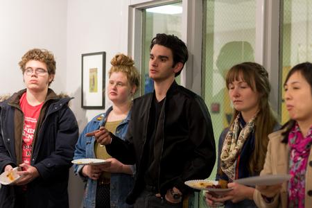 Matthew Watkins, senior, presents a question for artist and professor Haelim Allen during her gallery talk. - Photo by Nikki Grim