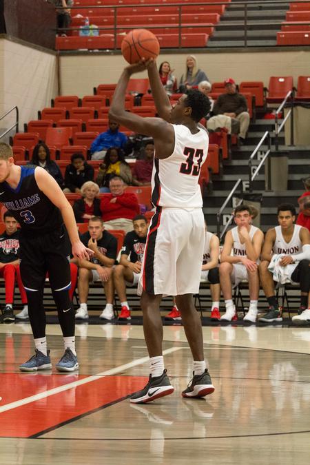 Tylandrius Parks, freshman, shoots free throws during a basketball game against Williams Baptist College. - Photo by Nikki Grim