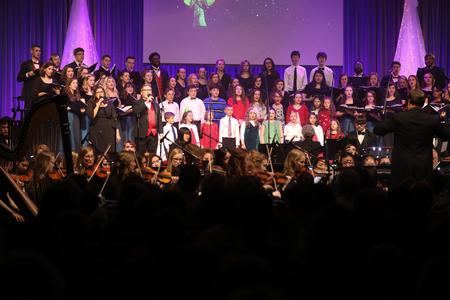 The combined choirs sing during the Union Christmas concert. - Photo by Kristi McMurry Woody