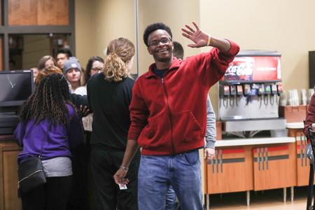 Students come into the Brewer Dining Hall for a late-night breakfast served by faculty and staff during finals week. - Photo by Kristi McMurry Woody