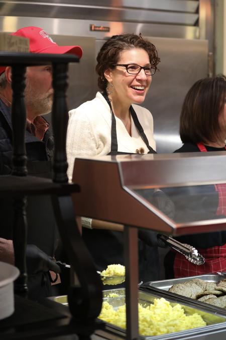 Erin Slater, director of the center for academic success, serves late-night breakfast to students during Food for Finals. - Photo by Kristi McMurry Woody