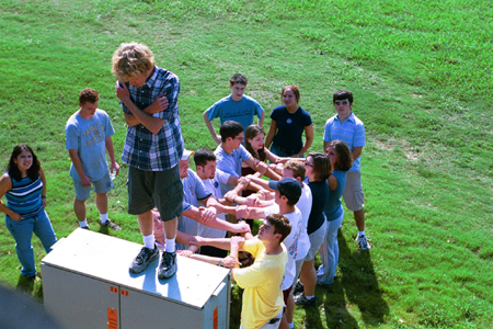 Keelan Cook's FOCUS group prepares to do the trust fall during New Student Orientation 2002. - Photo by Justin Veneman