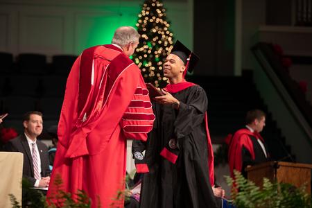 Terrance Pryor, master of Christian studies, receives his diploma during Fall Commencement. - Photo by Kristi McMurry Woody