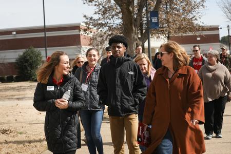 Hannah Daniel, student enrollment counselor, leads a tour during a Day at the U. - Photo by Sarah Palmer Goff