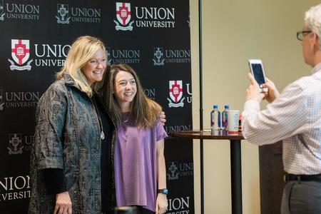 Karen Kingsbury poses for a photo during a book signing in the Logos Library. - Photo by Kristi McMurry Woody