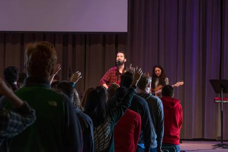 Students worship during chapel. - Photo by Joey Echeverria