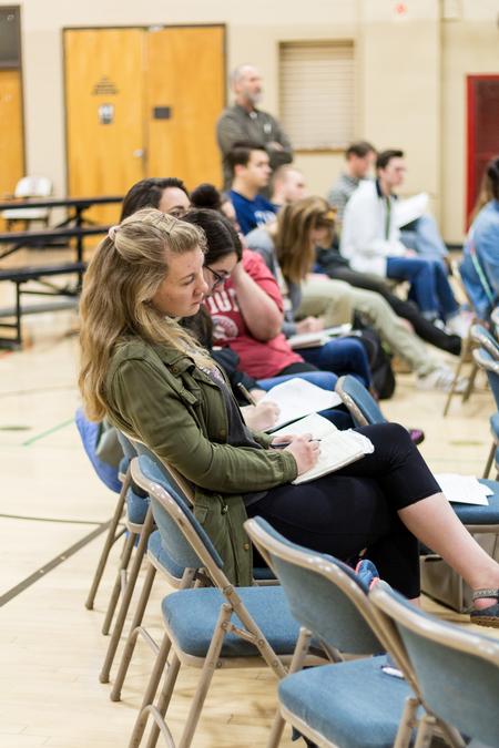 Students take notes during the Simon Levin ceramics workshop. - Photo by Nikki Grim
