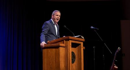 Dub Oliver, president of the university, speaks in chapel. - Photo by Joey Echeverria