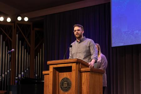 Austin Maddox, public relations major, talks about his upcoming GO Trip during the GO Trip commissioning chapel. - Photo by Joey Echeverria