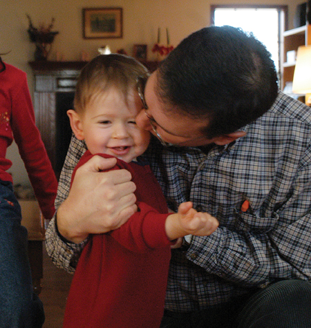 <i>Salazar Family C&C Profile</i> - Joel receives a goodbye kiss before his father leaves for work. - Photo by Kristen Nicole Sayres