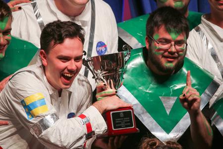 Members of ATO celebrate winning the small group competition at the 2019 Variety Show. - Photo by Hannah Heckart