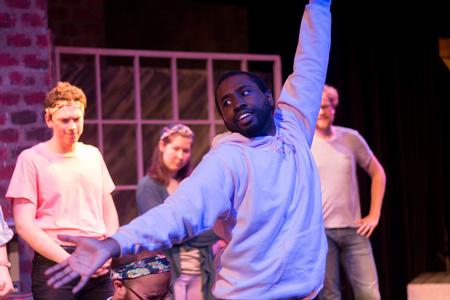 Korey Adams, Spanish major, performs with Blank Slate Improv in the W.D. Powell Theatre. - Photo by Nikki Grim
