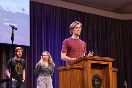 Students give reports from their spring GO Trips during chapel. - Photo by Joey Echeverria