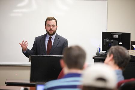 Ben Dubis, digital media communications major, gives his presentation during the annual Scholarship Symposium. - Photo by Kristi McMurry Woody