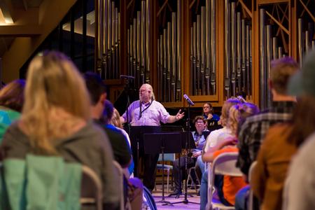 David McClune, professor of music, directs his final Jazz Band Concert before retirement. - Photo by Nikki Grim