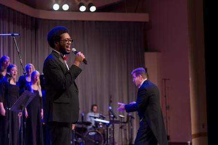 Richard Kidd, music major, performs in the Spring Choral Concert. - Photo by Nikki Grim
