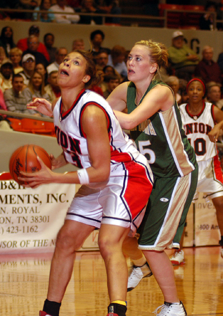Stephanie Clark (33) gets in postion to shoot in Union's semifinal win over Point Loma Nazarene in the NAIA Women's National Tournament. - Photo by Morris Abernathy