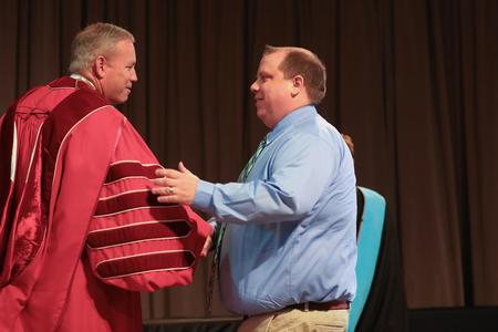 Josh Simmons, director for eLearning success and media services, is named Staff Member of the Year during Awards Day Chapel. - Photo by Kristi McMurry Woody