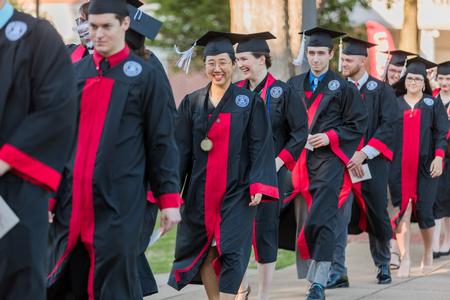 Undergraduates process into spring commencement. - Photo by Kristi McMurry Woody