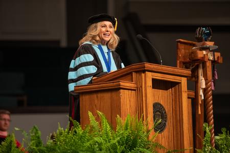 Beverly Absher-Bone, dean of the school of adult and professional studies, delivers the commencement address during summer graduation. - Photo by Kristi McMurry Woody