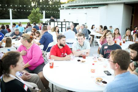 Guests enjoy the EDGE program back-to-school bash at Casey Jones Village. - Photo by Kristi McMurry Woody
