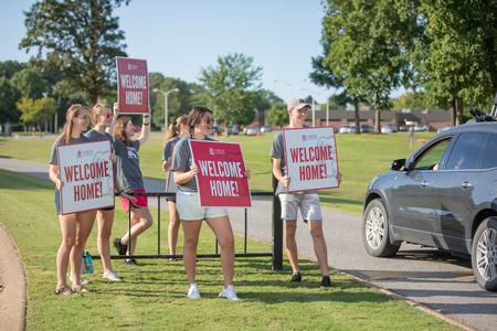 Student leaders welcome new students to campus on move-in day. - Photo by Kristi McMurry Woody