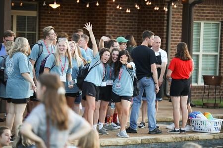 Welcome Week leaders enjoy the ice cream social at the Olivers' home in Jackson, TN. - Photo by Kristi McMurry Woody