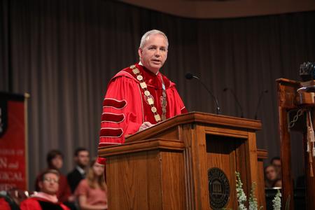 Dub Oliver, president of the university, speaks in Convocation. - Photo by Kristi McMurry Woody