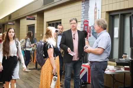 Chris Blair, professor of communication arts, talks about the BIOCOM UK trip during the Study Abroad Fair. - Photo by Kristi McMurry Woody