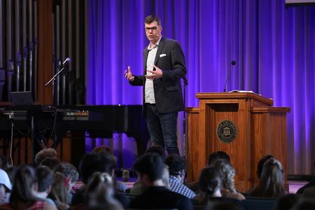 Micah Fries speaks in chapel in the first of three Faith in Practice services.  - Photo by Kristi McMurry Woody