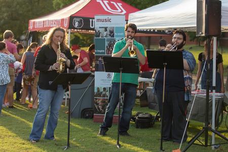 The music department plays music at their booth during Family Weekend Union Night. - Photo by Kristi McMurry Woody