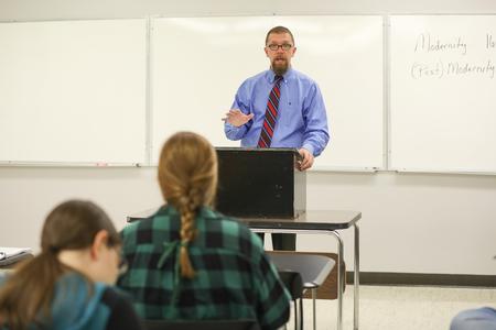 Justin Barnard, professor of philosophy, teaches a class. - Photo by Kristi McMurry Woody