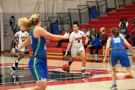 Sadie Knee plays in a basketball game against West Florida. - Photo by Kristi McMurry Woody