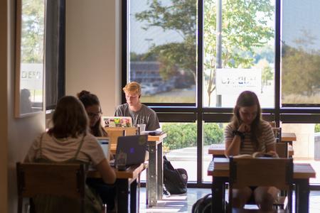 Students enjoy the atmosphere of Modero, one of two coffee shops on campus. - Photo by Nikki Grim
