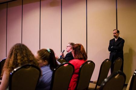 Hunter Baker, dean of the college of arts and sciences and professor of political science, asks a question during the annual Constitution Day Lecture.  - Photo by Jess Newendyke