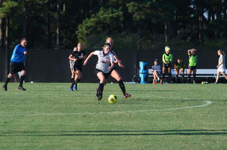 Candace Haney dribbles downfield during a game against Spring Hill College. - Photo by Jess Newendyke